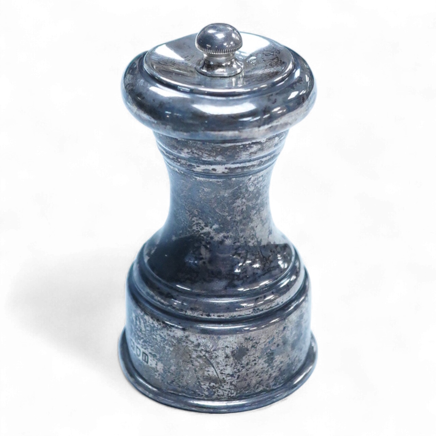 An Edwardian silver mounted pepper mill, by Joseph Braham, London 1908, height 84mm.